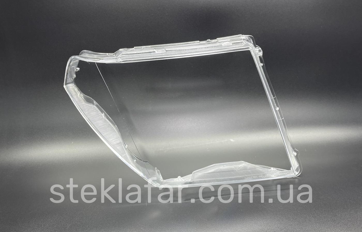 Стекло фары Nissan Frontier Navara Pathfinder D40 (2004-2020) USA